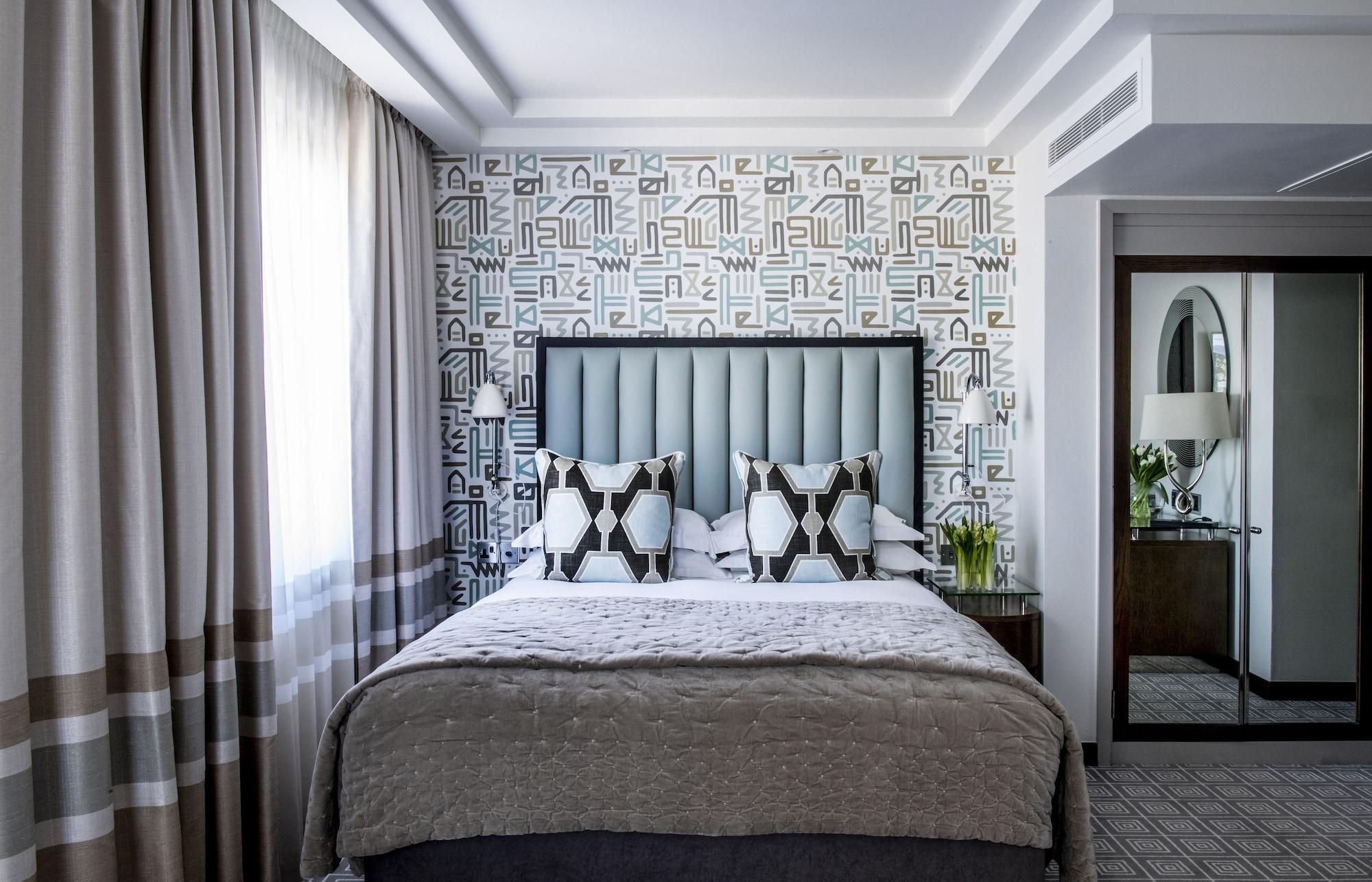 The Marylebone Hotel Londra Esterno foto A bedroom at the hotel